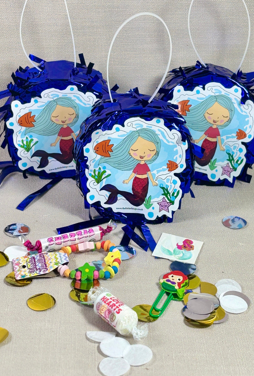 Mini Mermaid piñata. with 5 mini gifts