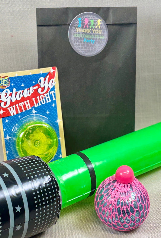 Black Paper Party Bag with Disco Sticker. Included a squishy light up ball, light up yoyo, and a inflatable microphone.