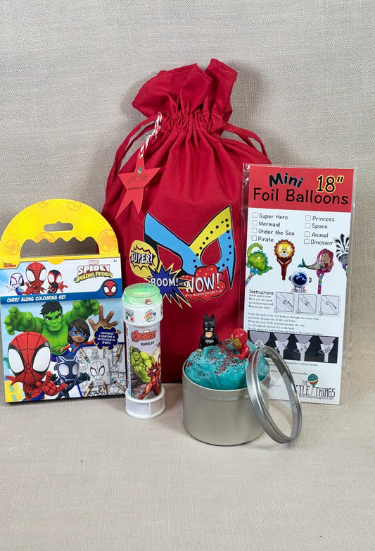superhero themed party large bag including bubbles a red drawstring bag, play doh and balloon. 