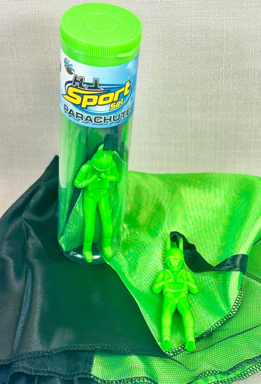 Green toy figures with a parachute and a container labeled 'Sport Parachute' on a light gray background.