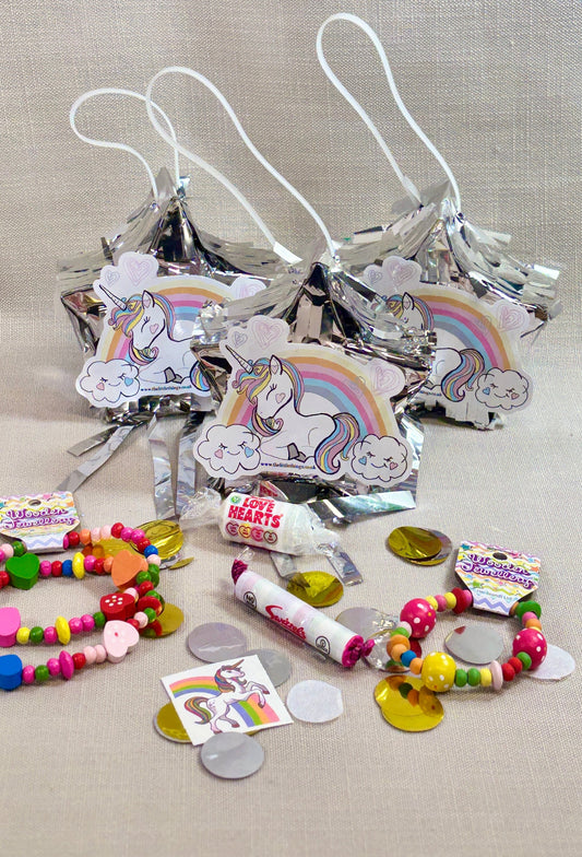Mini Unicorn piñata, with Wooden necklace and bracelet. Tattoo and sweets