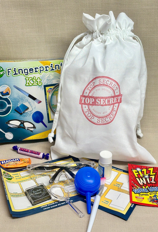 Finger Print kit with 'Top Secret' drawstring bag and sweets.