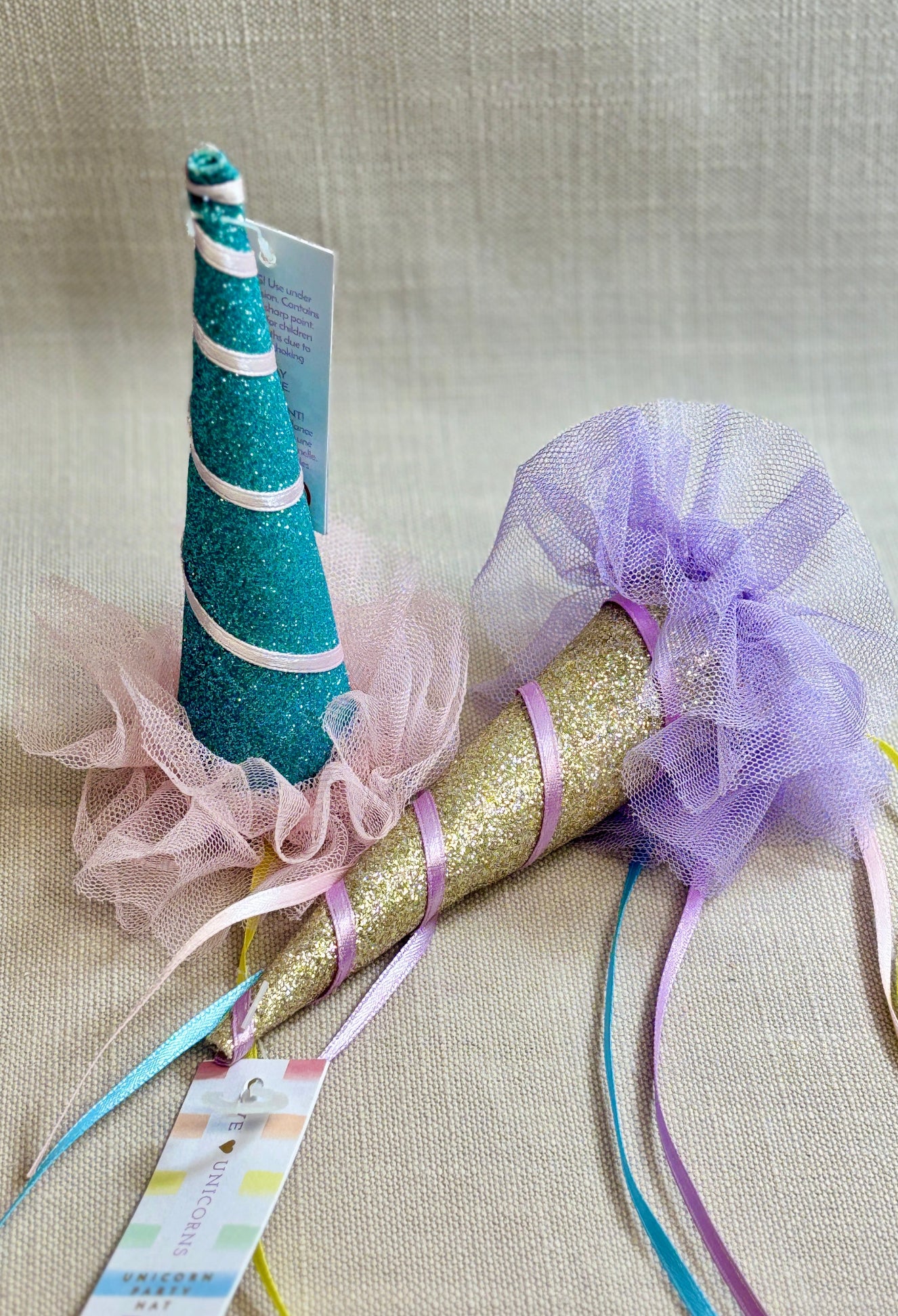 Two decorative Unicorn party hats that clips into the hair.