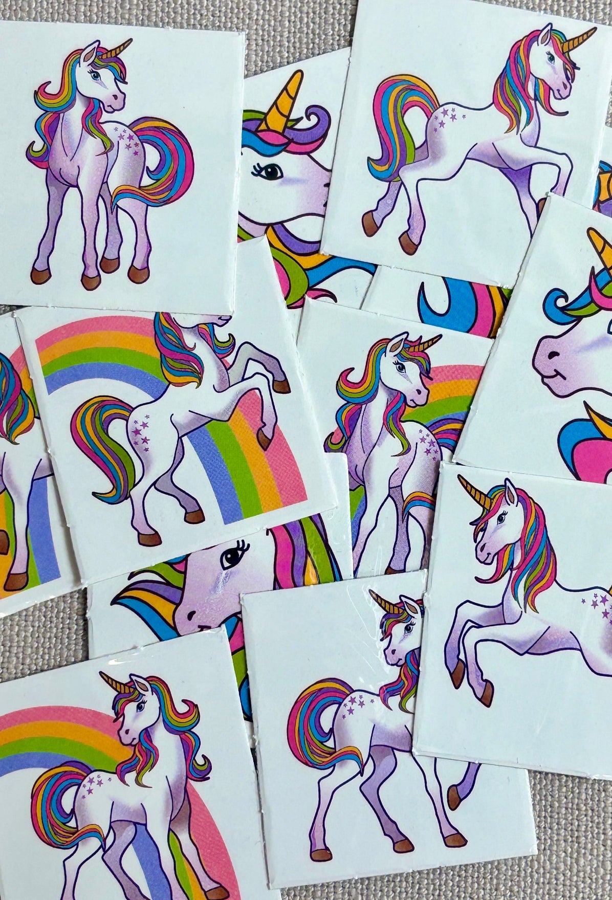 Collection of unicorn-themed temporary tattoos.